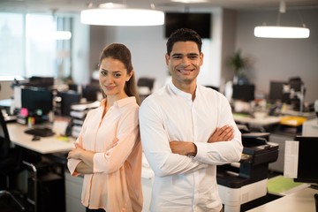 Smiling of business people standing in office