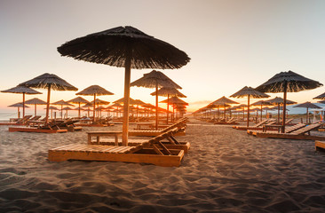 Deck chairs on the beach © Weston