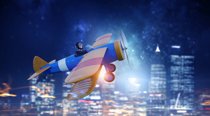 Woman in drawn airplane . Mixed media