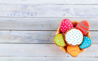 Easter homemade gingerbread cookie over wooden table