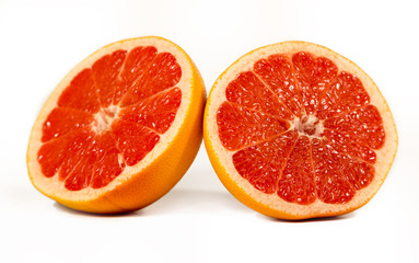 Naklejka na ściany i meble Grapefruit Citrus Fruit With Half Grapefruit Isolated on White Background With Clipping Path