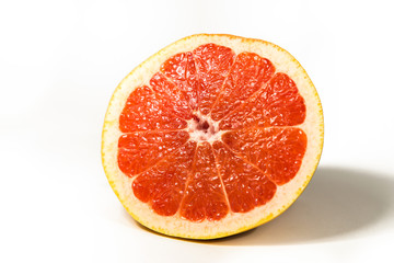 Fototapeta na wymiar Fresh Red Grapefruits on a White Background