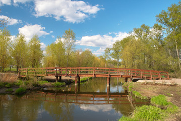 Fototapeta na wymiar Wooden bridge in springtime
