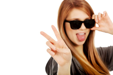Young teenage woman wearing sunglasses