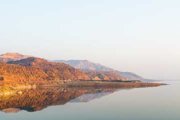 Fototapeta na wymiar Scenic View Of Calm Dead Sea Against Clear Sky