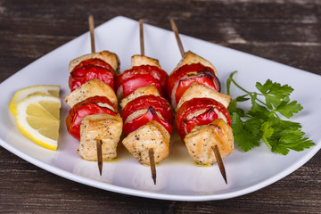 Tasty grilled meat and vegetables on skewer