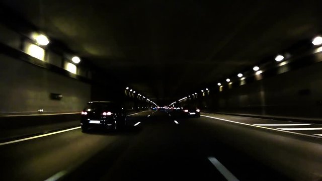 Night Car Trip on a tunnel in Paris peripheral beltway