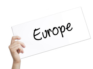 Europe Sign on white paper. Man Hand Holding Paper with text. Isolated on white background