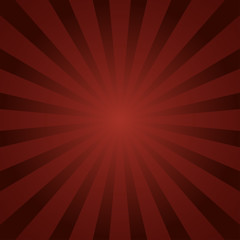 Sun burst on a red background