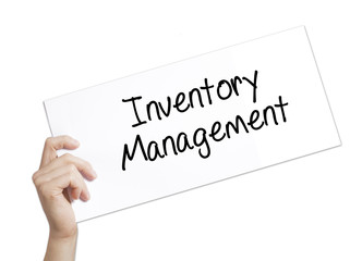 Inventory Management Sign on white paper. Man Hand Holding Paper with text. Isolated on white background.