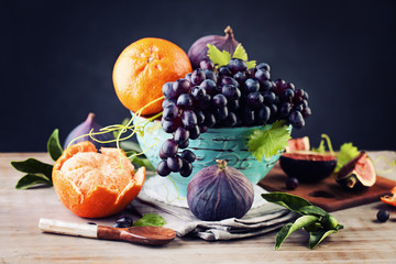 Healthy Food Background with Orange, Grape and Figs Fruits