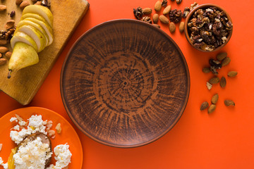 Healthy breakfast - cottage cheese, nuts and fruit