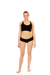 Athletic young woman in sports underwear