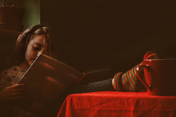 Little girl reading a book.