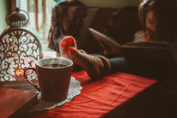 Little girl reading a book.