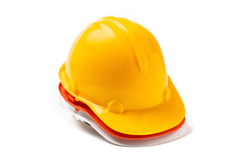 Fototapeta premium Red, yellow, white engineer hat work safety on white background.