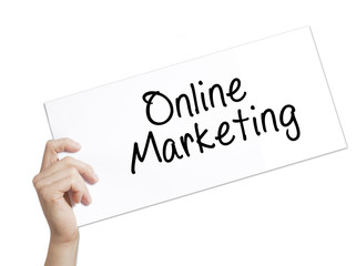 Online Marketing Sign on white paper. Man Hand Holding Paper with text. Isolated on white background