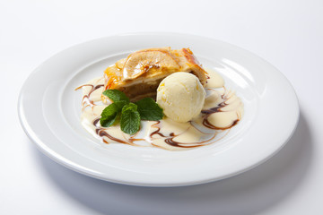 Apple strudel with vanilla ice cream