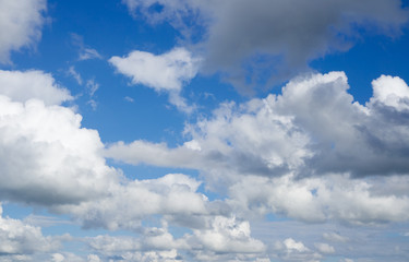 Naklejka na ściany i meble Blue sky with clouds. Heaven, clouds flying against sky.