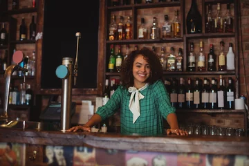 Foto op Canvas Portrait of beautiful female bar tender © WavebreakMediaMicro
