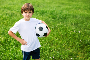 Young Boy In Football Team.