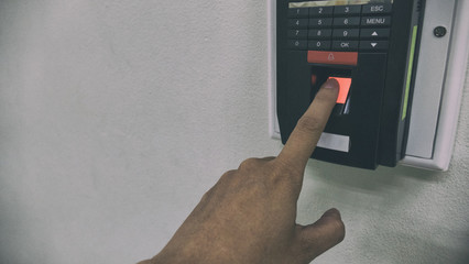 Finger on fingerprint scanner device for access control