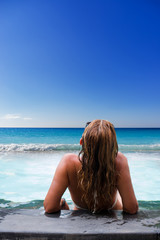 Top view. Woman in swimming pool.