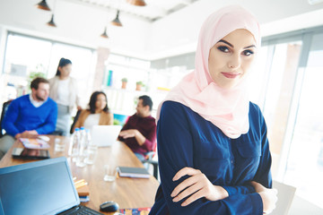 Portrait of muslim business woman wearing hijab.
