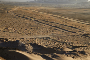 tracks in the Sahara desert