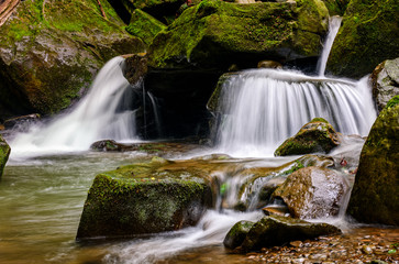 small cascade on the river among bouders