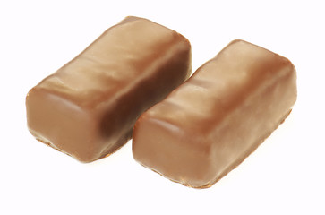 Two sweet chocolate candies on white background