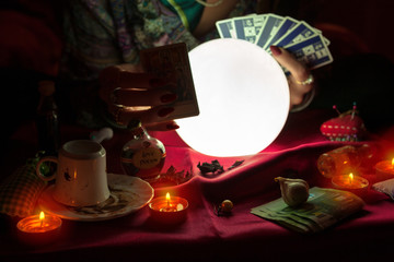 Woman fortune teller receive money from another woman