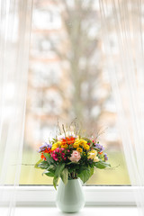 beautiful bouquet on windowsill