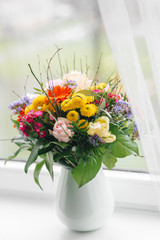 beautiful bouquet on windowsill