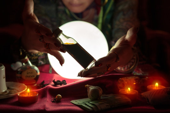 Woman fortune teller receive money from another woman