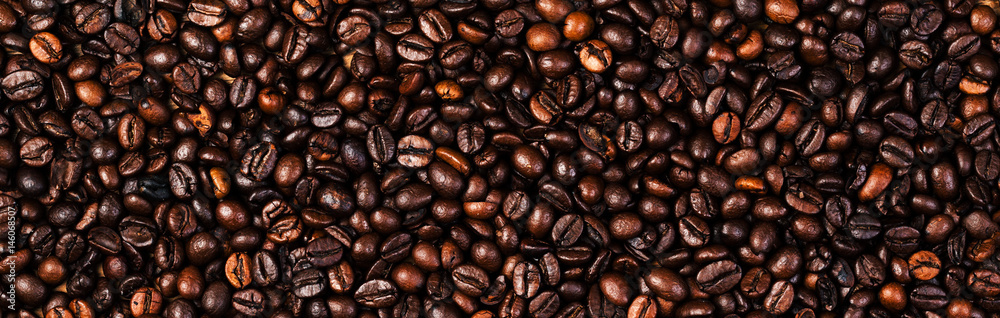 Aufkleber coffee beans background macro. dark roasted coffee beans textured wallpaper for your design with cop