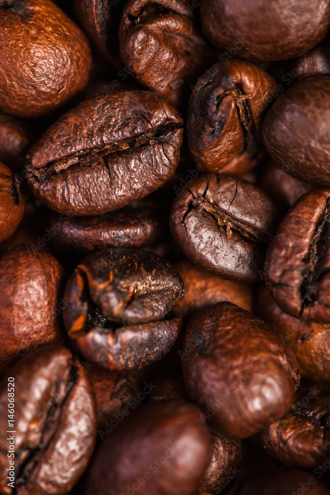 Aufkleber coffee beans background macro. dark roasted coffee beans textured wallpaper for your design with cop
