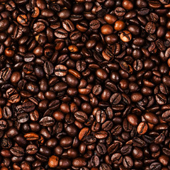Coffee beans background macro. Dark Roasted coffee beans textured wallpaper for your design with copy space.