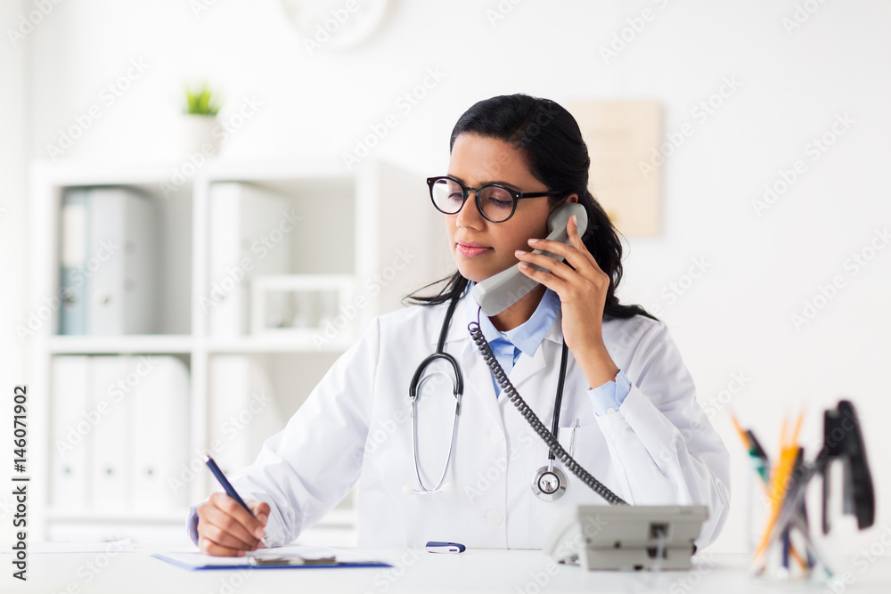 Sticker doctor with clipboard calling on phone at hospital