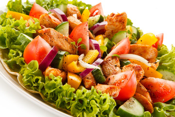 Grilled chicken strips with vegetable salad