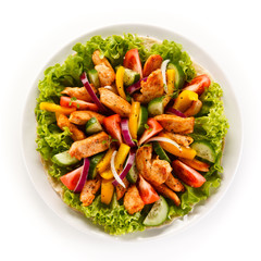 Grilled chicken strips with vegetable salad