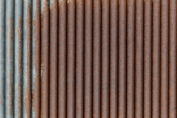 Old rusty texture of corrugated metal. Rusted galvanized iron plate