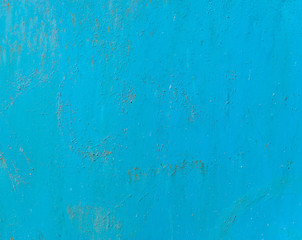 Cracked metal texture painted in blue 