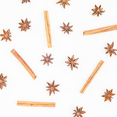 Natural pattern of cinnamon and anise tree on white background. Spice. Flat lay. Top view.