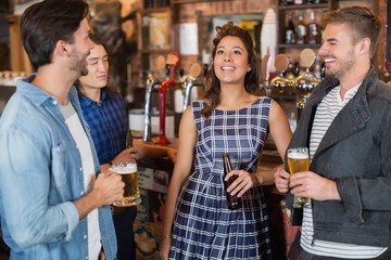Friends enjoying together in pub