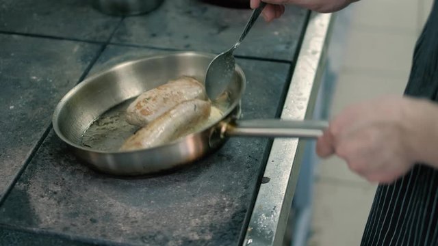 Cook in the restaurant fry meat and Vegetables 4k