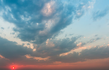 colorful dramatic sky with cloud at sunset