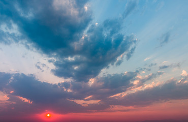 colorful dramatic sky with cloud at sunset