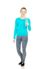 Fototapeta premium Beautiful woman with bottle of mineral water.
