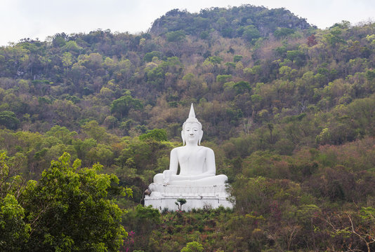 Big white buddha statue sitting on the mountain at Pakchong, Nakhon Ratchasima, Thailand